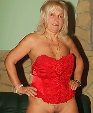 Curvy granny with big flabby tits Remy does a striptease and swallowing a big fat cock